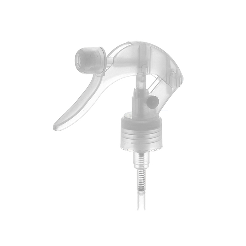 45-degree angled view of clear mini trigger sprayer showing nozzle design and lockable button, 24-410 neck finish
