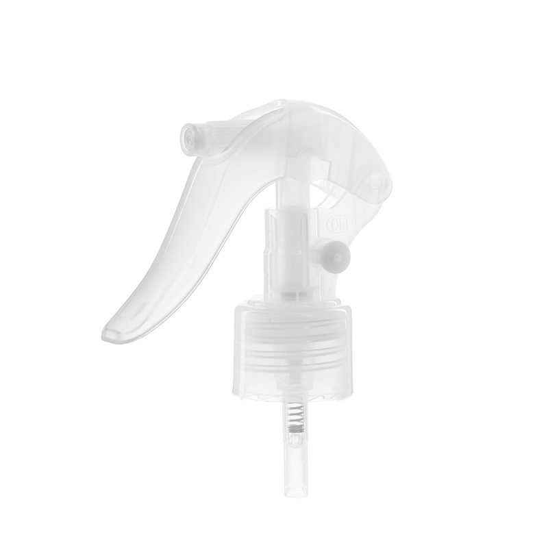 45-degree angled view of clear mini trigger sprayer showing nozzle and lockable button, 24mm 24-410, fine mist spray