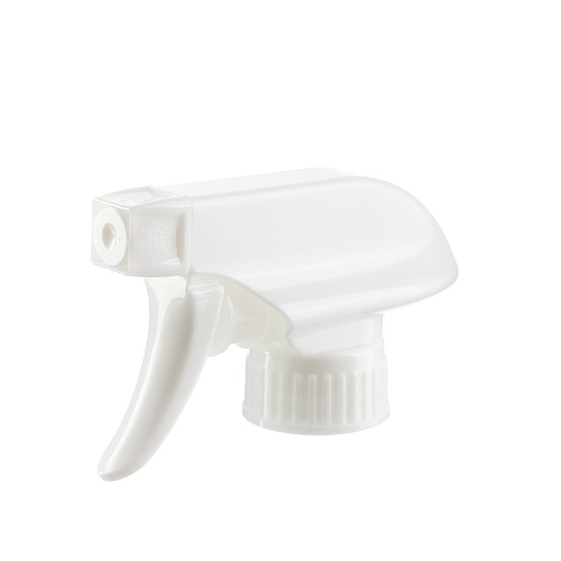 45-degree angled view of white trigger sprayer showing spray/stream nozzle and trigger design, 28-400 neck, 1.1 ml dosage