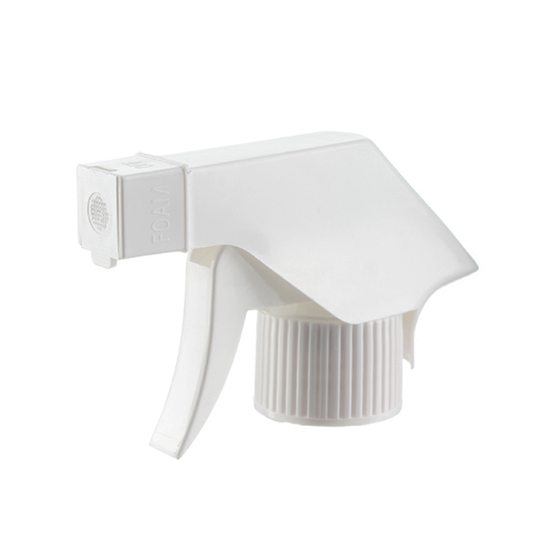 45-degree angled view of white economical foaming trigger sprayer showing flip-open mesh head and trigger design, 28-410 neck, 0.6 ml dosage