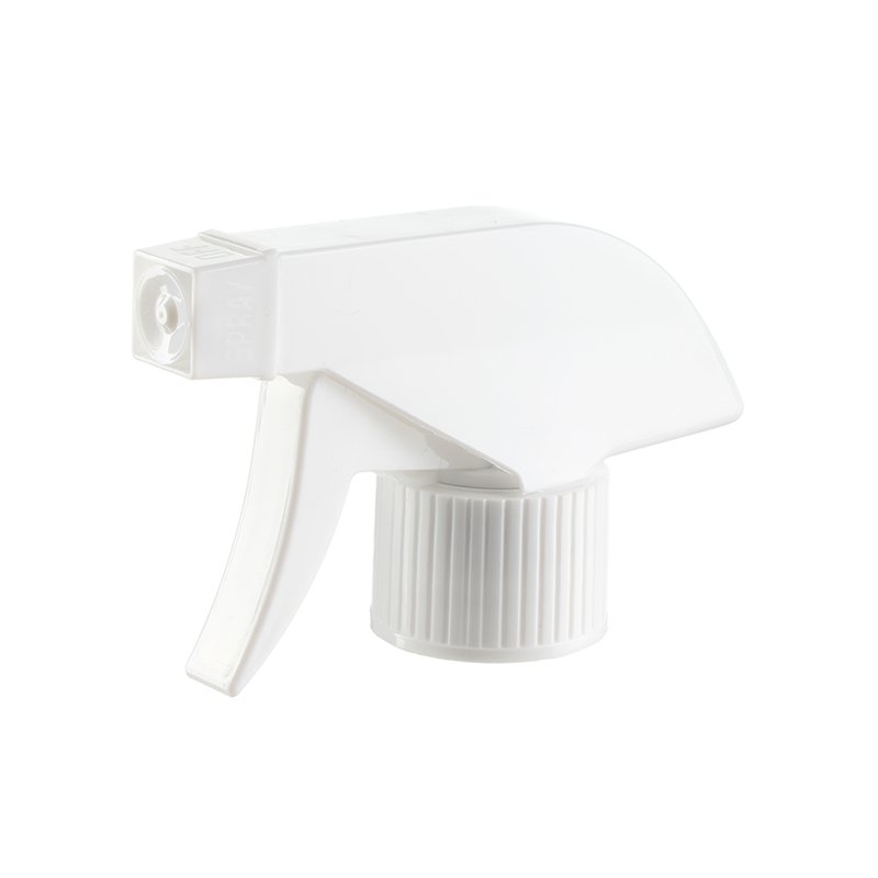 45-degree angled view of white economical trigger sprayer showing switchable spray/stream nozzle and ergonomic trigger design, 28mm, 0.6 ml dosage