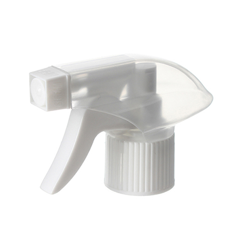 45-degree angled view of clear and white economical trigger sprayer showing spray/stream nozzle and ergonomic trigger, 28-415 neck, 0.6 ml dosage