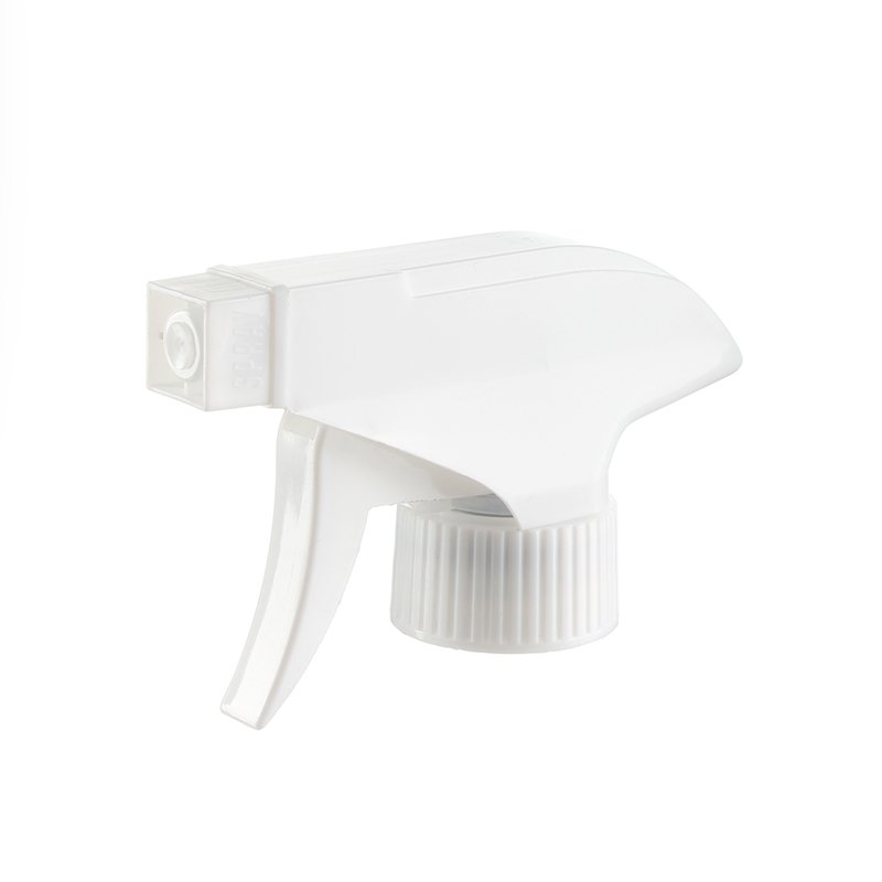 45-degree angled view of white economical trigger sprayer showing spray/stream nozzle and trigger design, 28-400 neck, 0.6 ml dosage