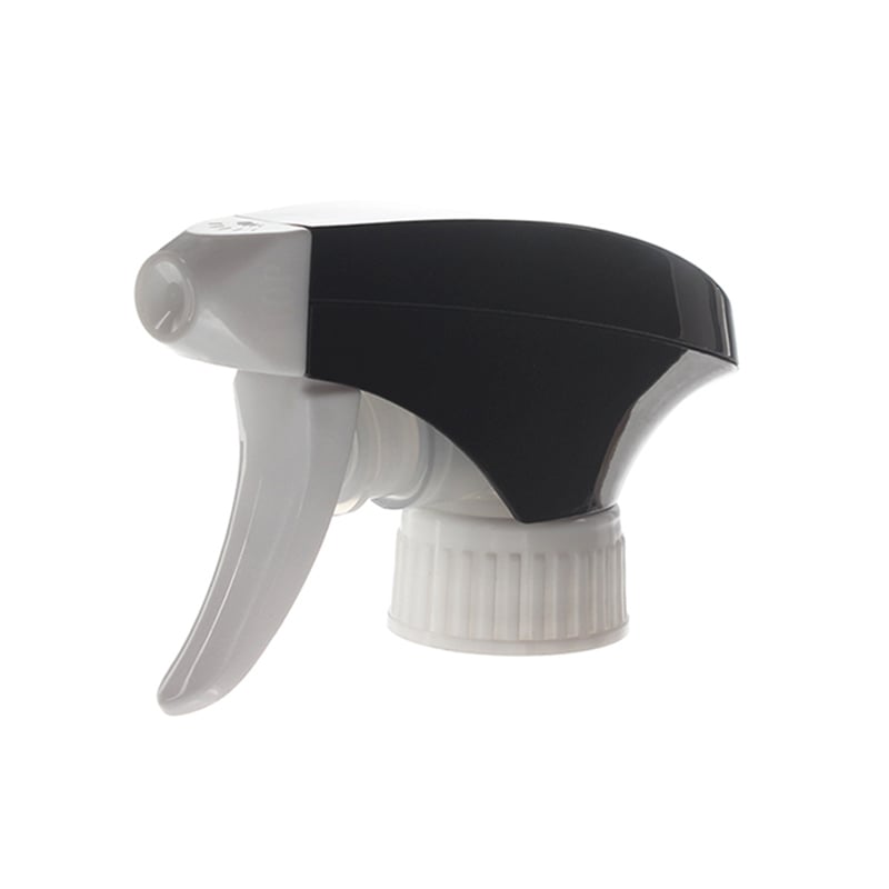 45-degree angled view of white and black all-plastic trigger sprayer showing spray/stream nozzle and dual-shroud structure, 28-400 neck, 1.2 ml dosage