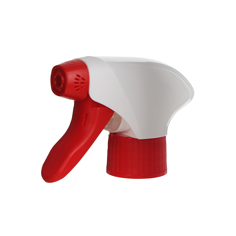 45-degree angled view of red and white all-plastic PCR trigger sprayer showing spray/stream nozzle and ergonomic design, 28-410 neck, 1.3 ml dosage