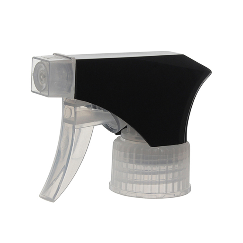 45-degree angled view of black and clear trigger sprayer showing single-spray nozzle and trigger design, 28-410 neck, 0.9 ml dosage
