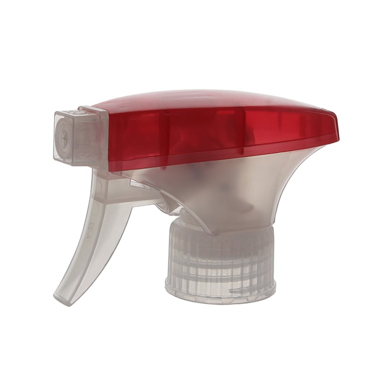 45-degree angled view of translucent red and clear general-purpose trigger sprayer showing spray/stream nozzle and dual-shroud structure, 28-410 neck, 0.9 ml dosage