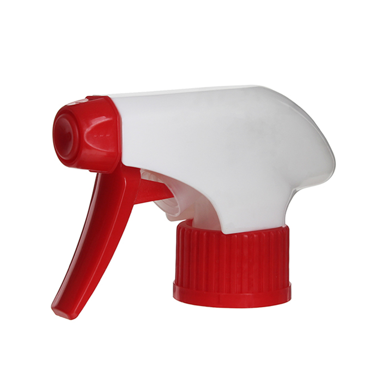 45-degree angled view of white and red ratchet closure trigger sprayer showing spray/stream nozzle and trigger design, 28-410 neck, 1.3 ml dosage