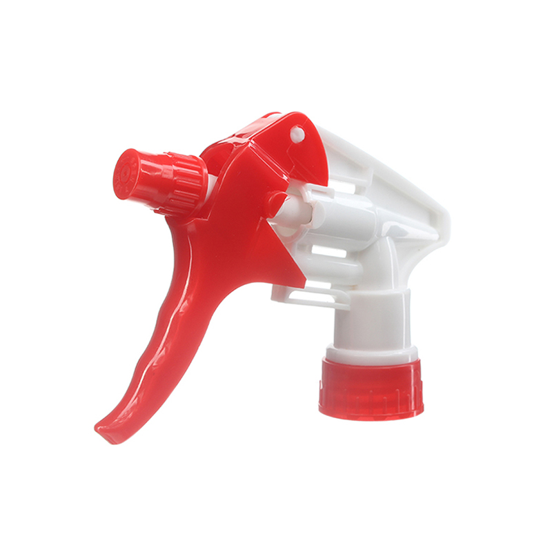 45-degree angled view of white and red chemical resistant trigger sprayer showing nozzle and trigger structure, 28-400 neck, 1.1 ml dosage