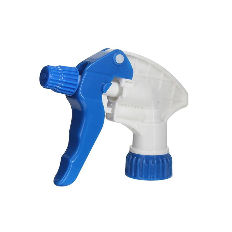 45-degree angled view of white and blue high-viscosity trigger sprayer showing nozzle and trigger for thick liquid dispensing, 28-400 neck, 1.1 ml dosage