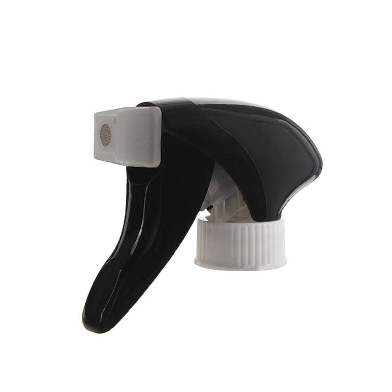 45-degree angled view of black and white all-plastic foam trigger sprayer showing switchable nozzle and trigger design, 28-400 neck, 1.2 ml dosage