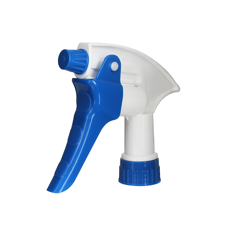 45-degree angled view of heavy-duty white and blue high output trigger sprayer showing nozzle and trigger structure, 28-410 neck, 3.5 ml dosage